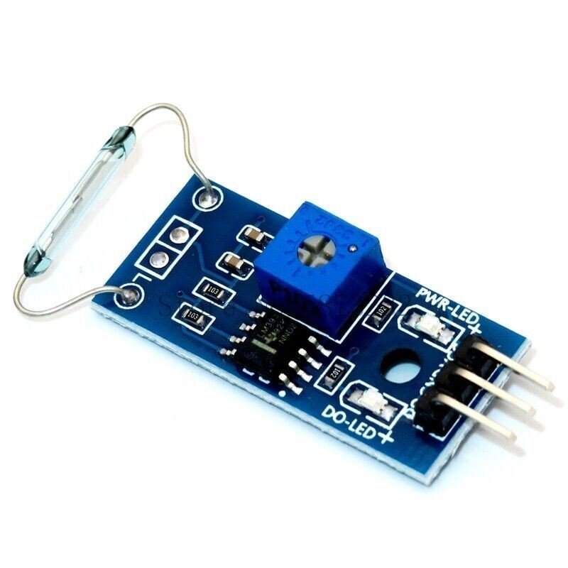 a small blue circuit board. at one end is a tiny glass tube switch. it is connected by short wire to the board, which has a potentiometer and three pins at the opposite end.